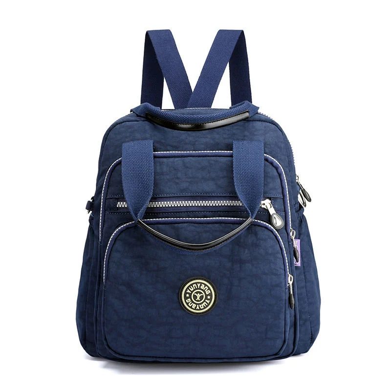 Compact Handled Backpack with Round Front Badge FF-141 by Feima Bag