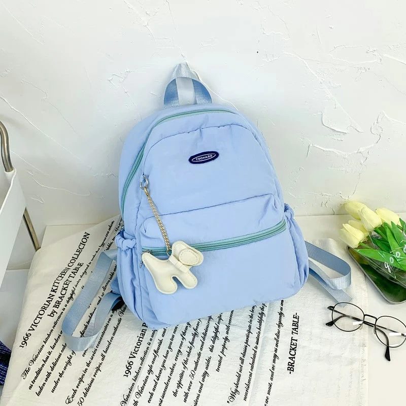 School Backpack with Gathered Side Pockets and Oval Label FG-159 by Feima Bag