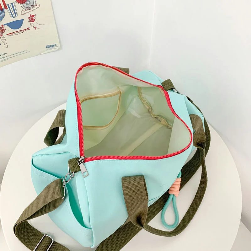 Compact duffel with a contrasting front zip FKC-002 by Feima Bag